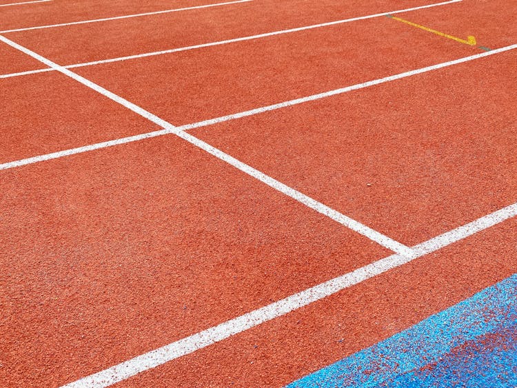 Close Up Of Lines On Athletics Stadium