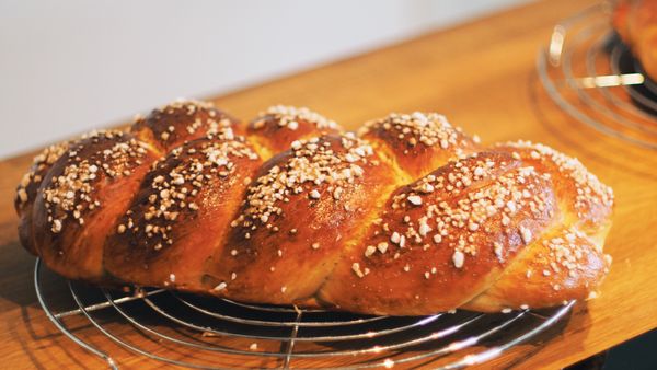 Braided enriched loaf with a glazed crust — photo by Jens Mahnke on Pexels
