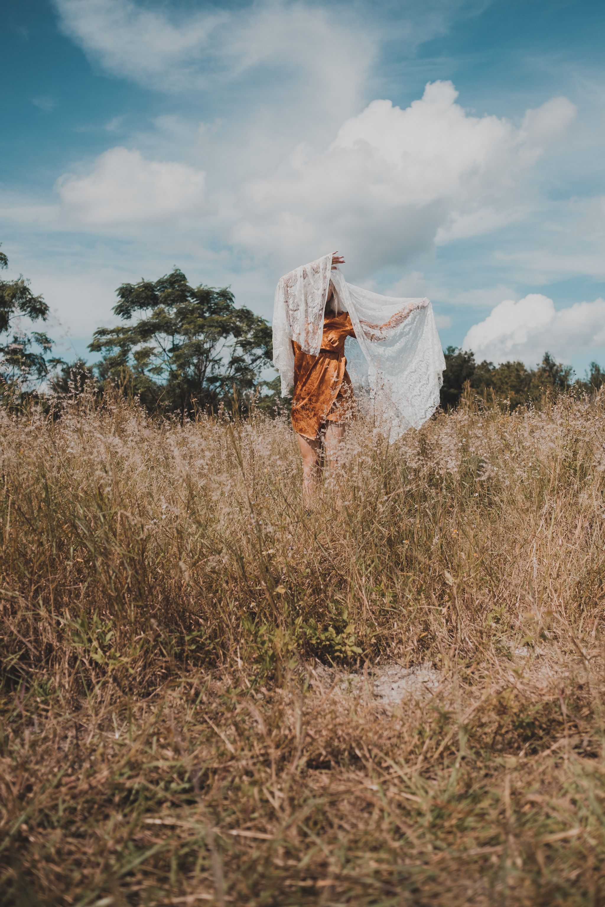 A Person Standing on Grass Field · Free Stock Photo