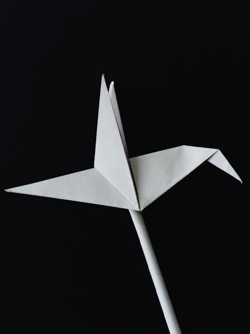 Close-Up Photo of a White Paper Crane