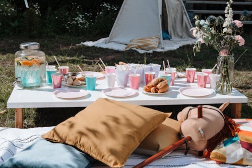 Free Food and Drinking Water on a Picnic Table Stock Photo