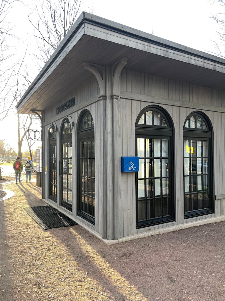 Gray House With Arched Windows