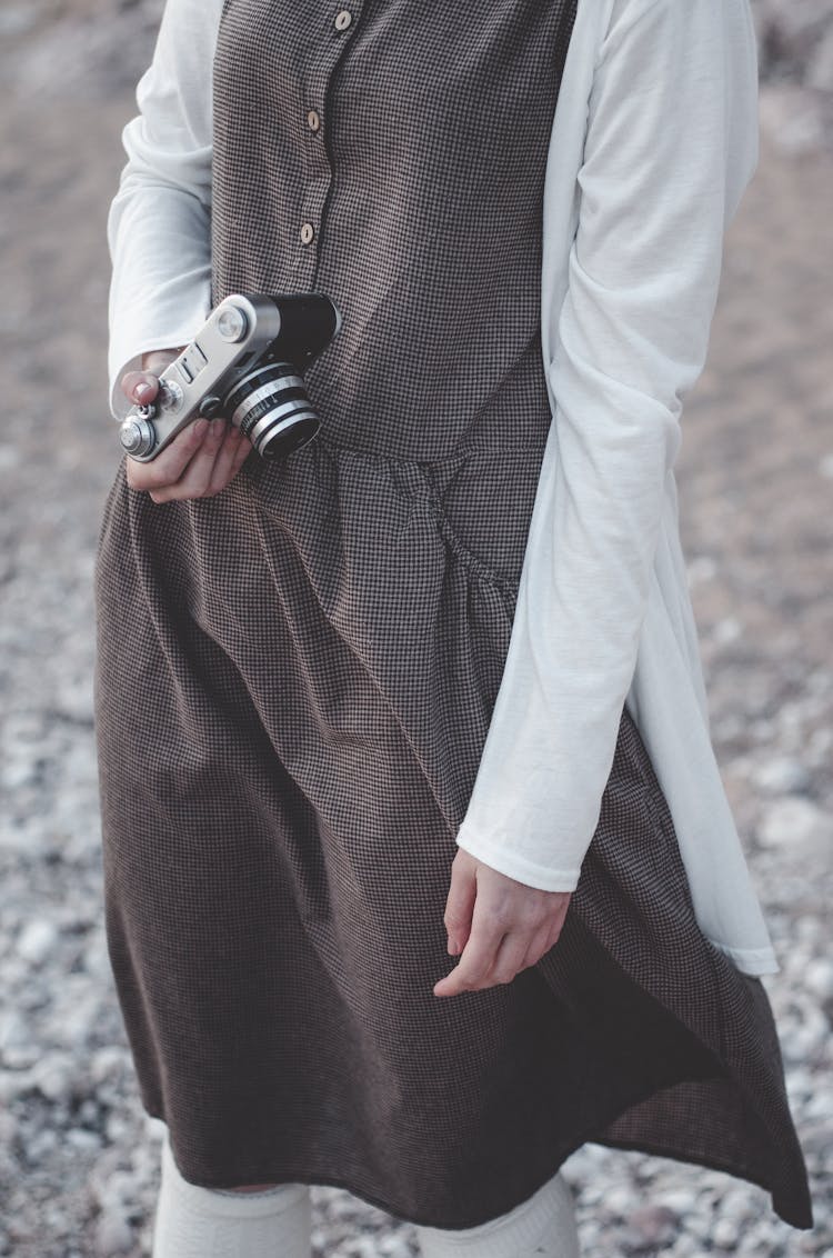 Woman Holding Camera