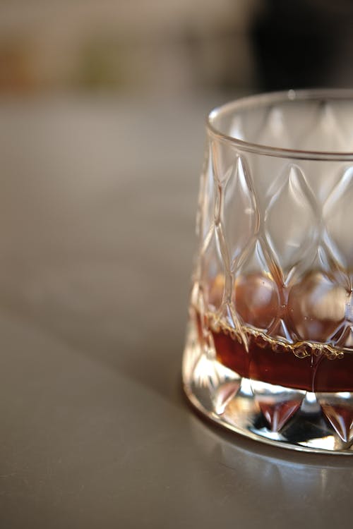 Free Clear Drinking Glass With Brown Liquid Stock Photo