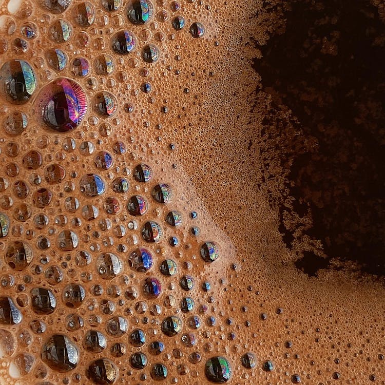 Closeup Of Fresh Coffee With Foam