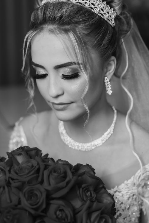 Free Classic black and white bridal portrait featuring a bride with roses and jewelry. Stock Photo