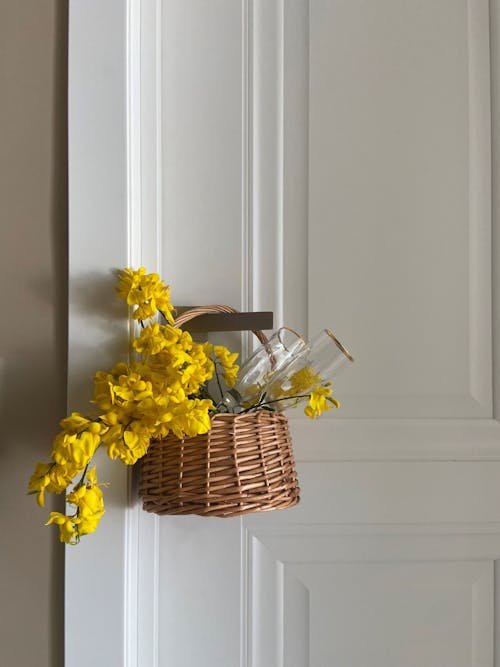 Yellow Flowers on Brown Wicker Basket