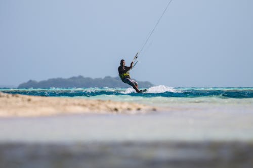 Foto profissional grátis de esportes aquáticos, homem, kitesurf