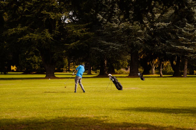 Man Playing Golf On A Golf Course