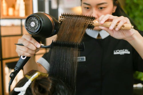 Hairdresser Doing Womans Hair