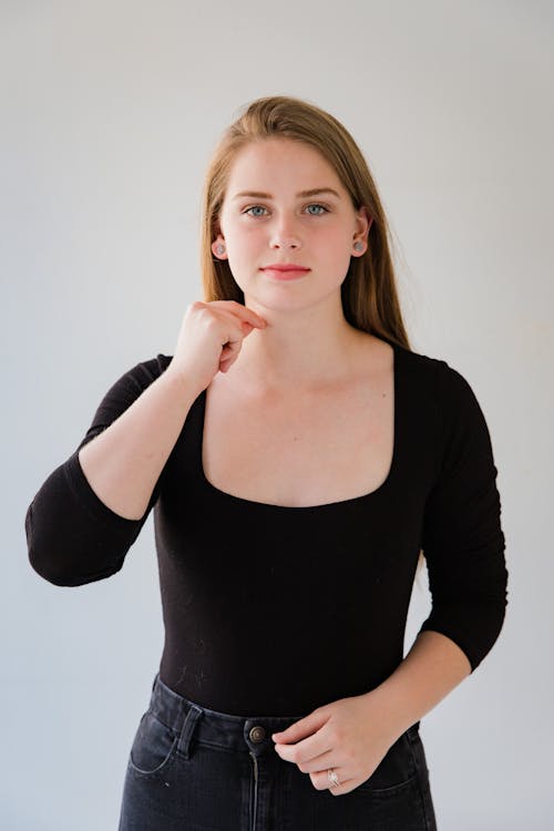 Woman in Black Blouse Using Sign Language