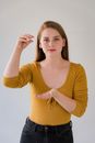 Portrait of Woman Showing Sign Language