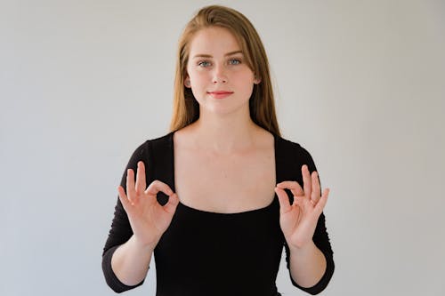 Blond Woman Using Sign Language