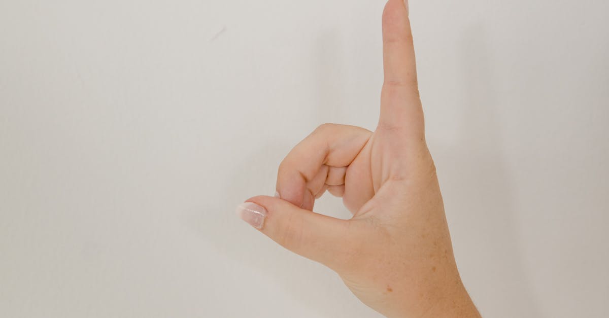 Womans Hand Showing Sign Language Gesture on White Background · Free ...