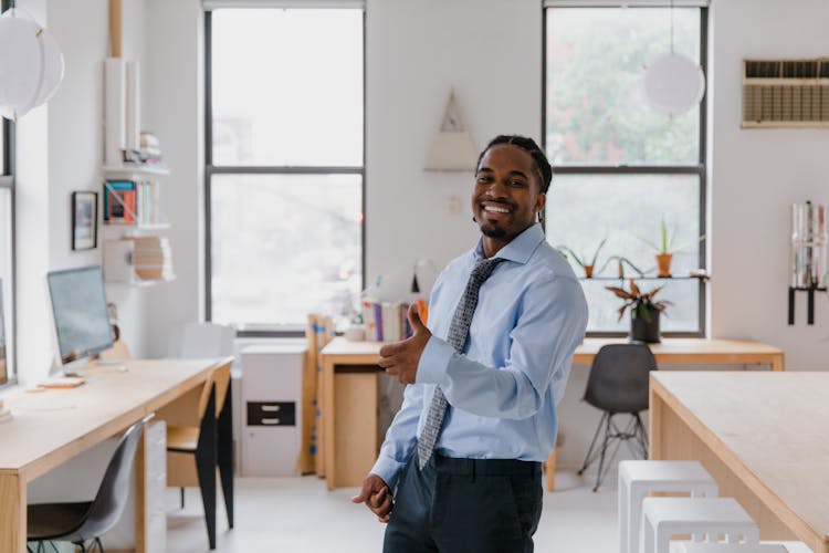 Portrait Of Smiling Businessman In Office