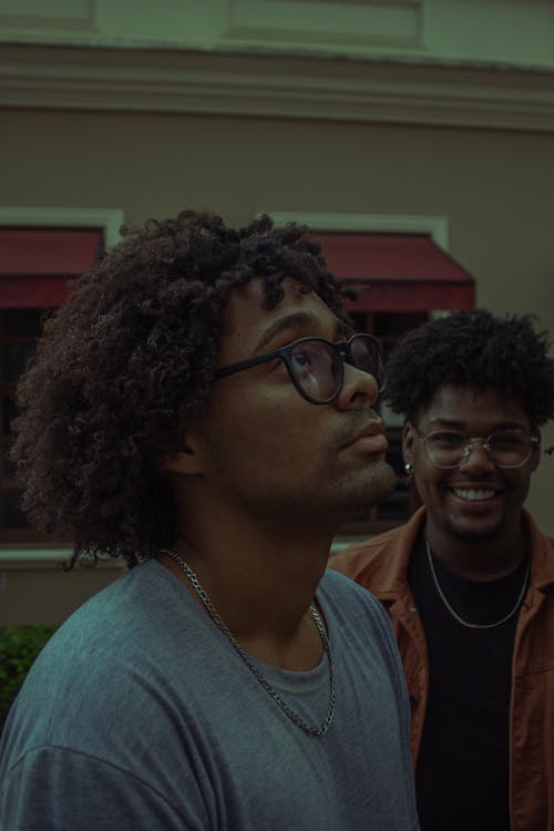 Man with Curly Hair Looking Up