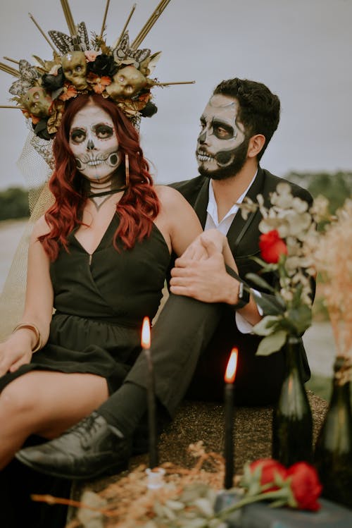 Free A Couple Wearing Halloween Make Up and Male Looking at Female  Stock Photo