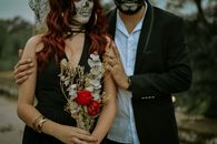 A Selective Shot of a Couple Wearing Halloween Make Up and Hugging 