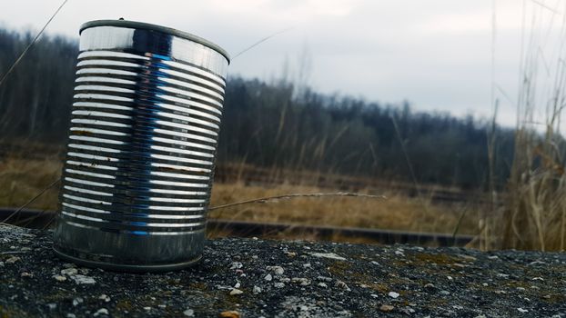 Tin Can on Gravel Surface