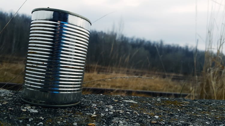 Tin Can On Gravel Surface