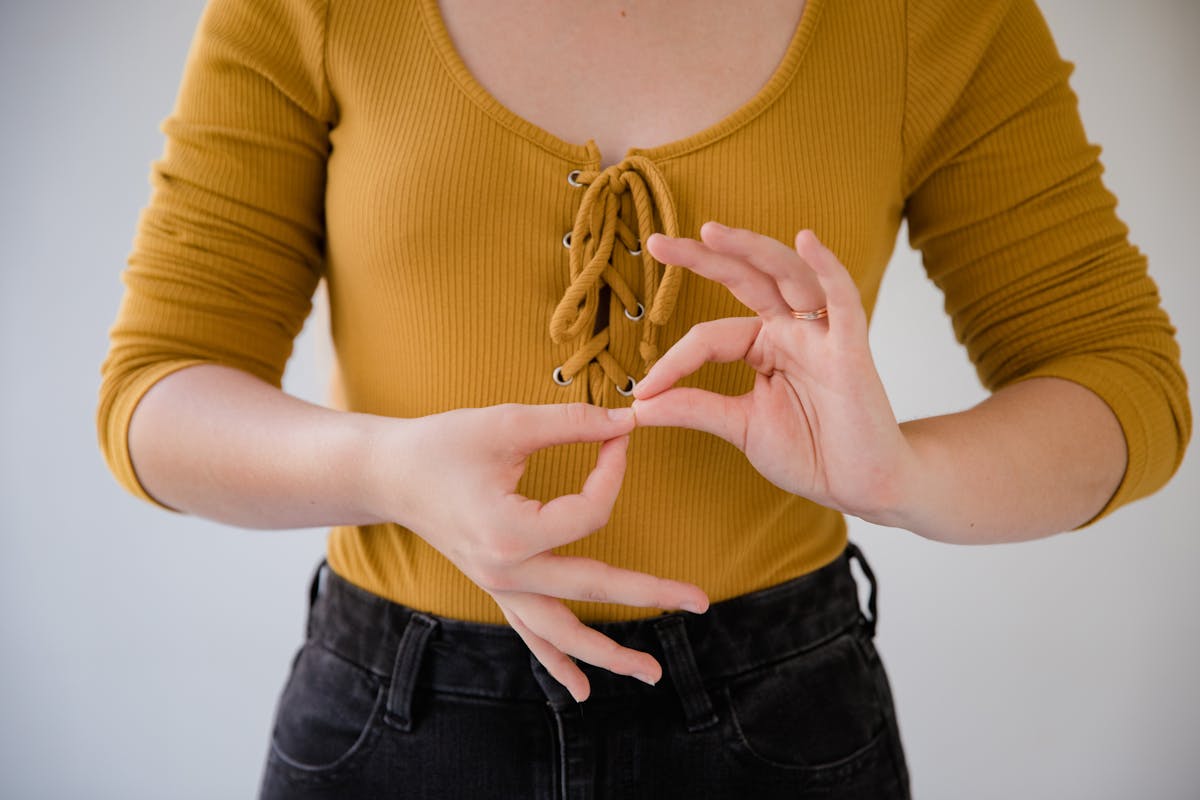 Woman Communicating by Finger Language
