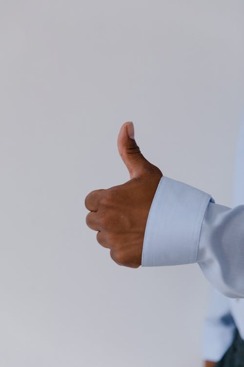 Free Close-up of Hand with Thumb Up Stock Photo