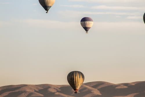 Baloons over Dunes on Desert