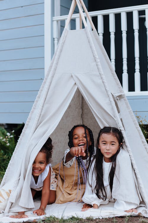 Free Three Young Girls in Tent Stock Photo