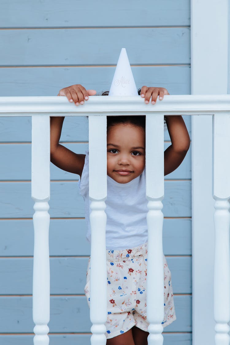 Young Girl On Porch