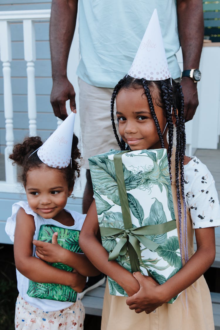 Two Young Girls At Party