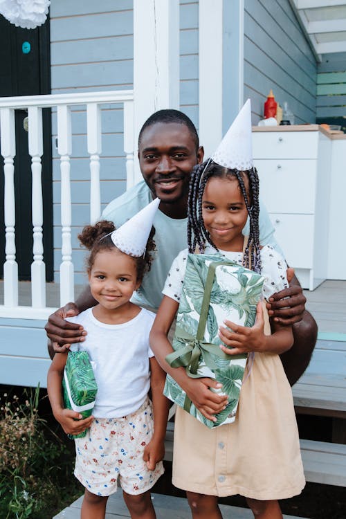 Безкоштовне стокове фото на тему «афро-американських дівчат, афроамериканський чоловік, батько»