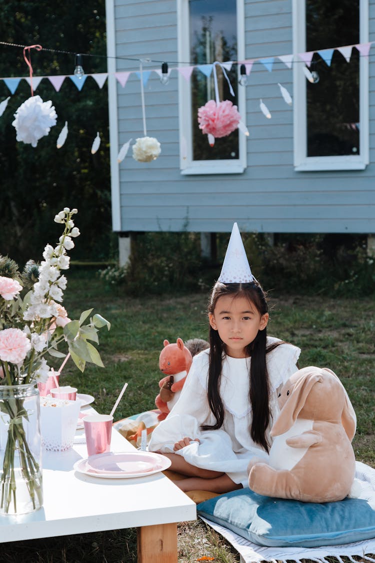 Young Girl At Garden Party