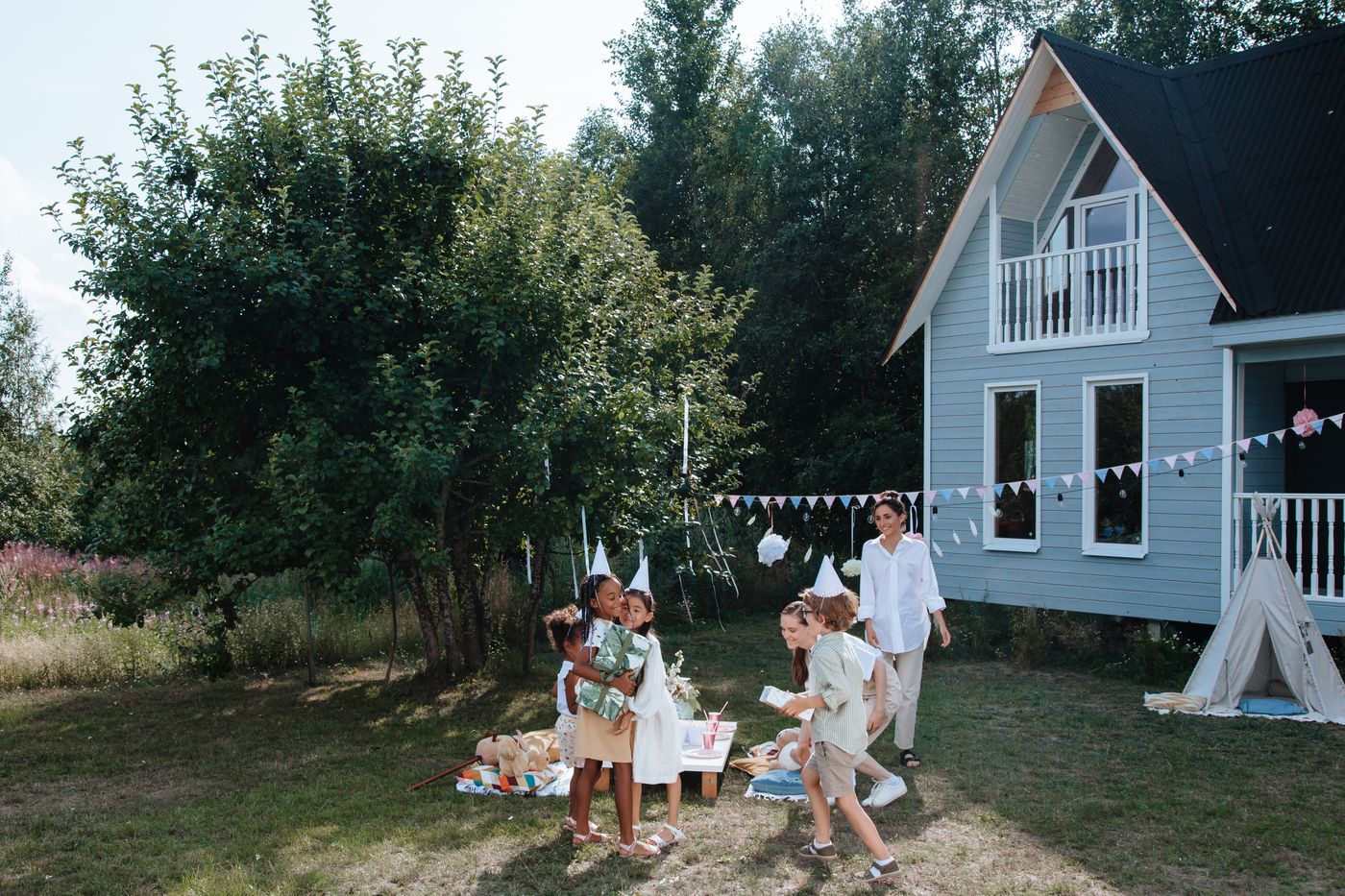 A family summer party in the garden of a cottage — photo by Ron Lach on Pexels