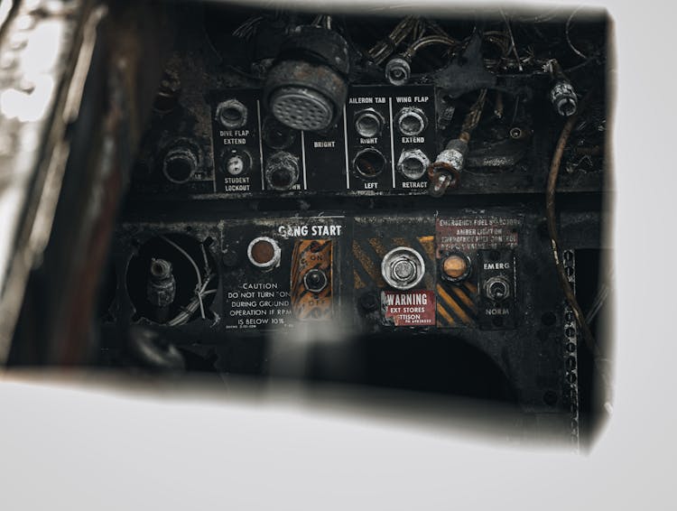 A Control Panel On An Old Airplane