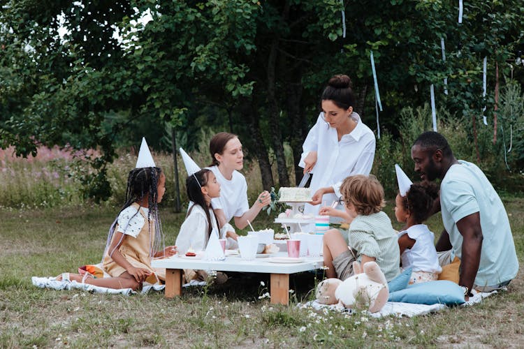 Family Celebrating Birthday In Garden