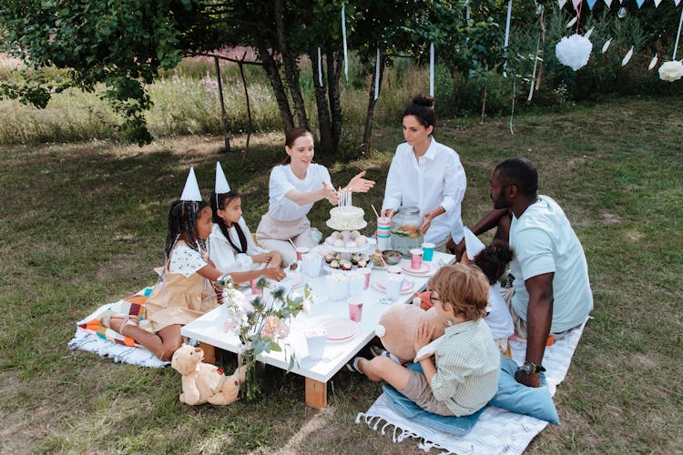 Family Celebrating Birthday In Garden