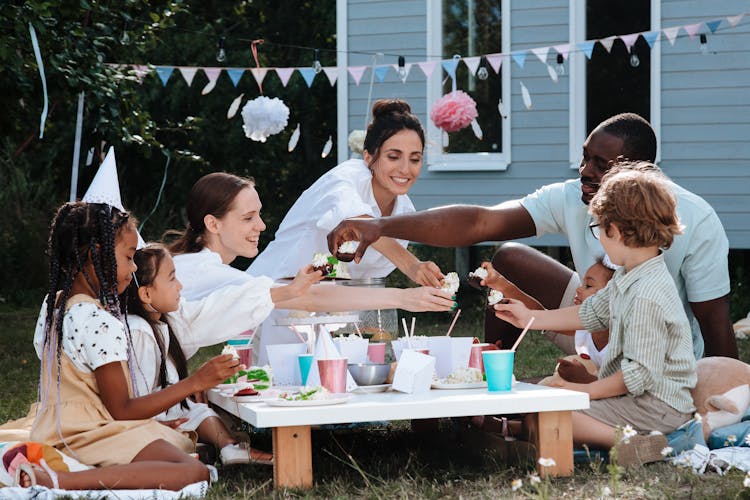 Family Celebrating Birthday In Garden