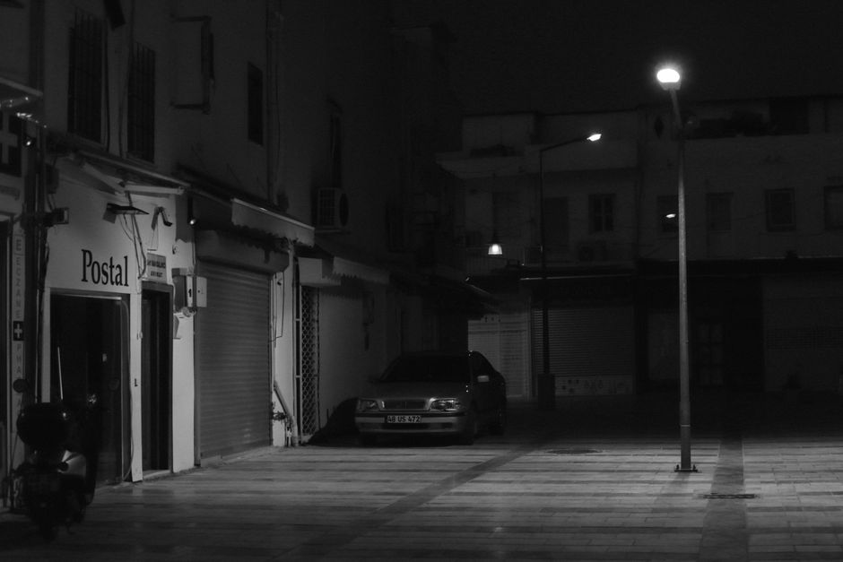 single car under streetlight