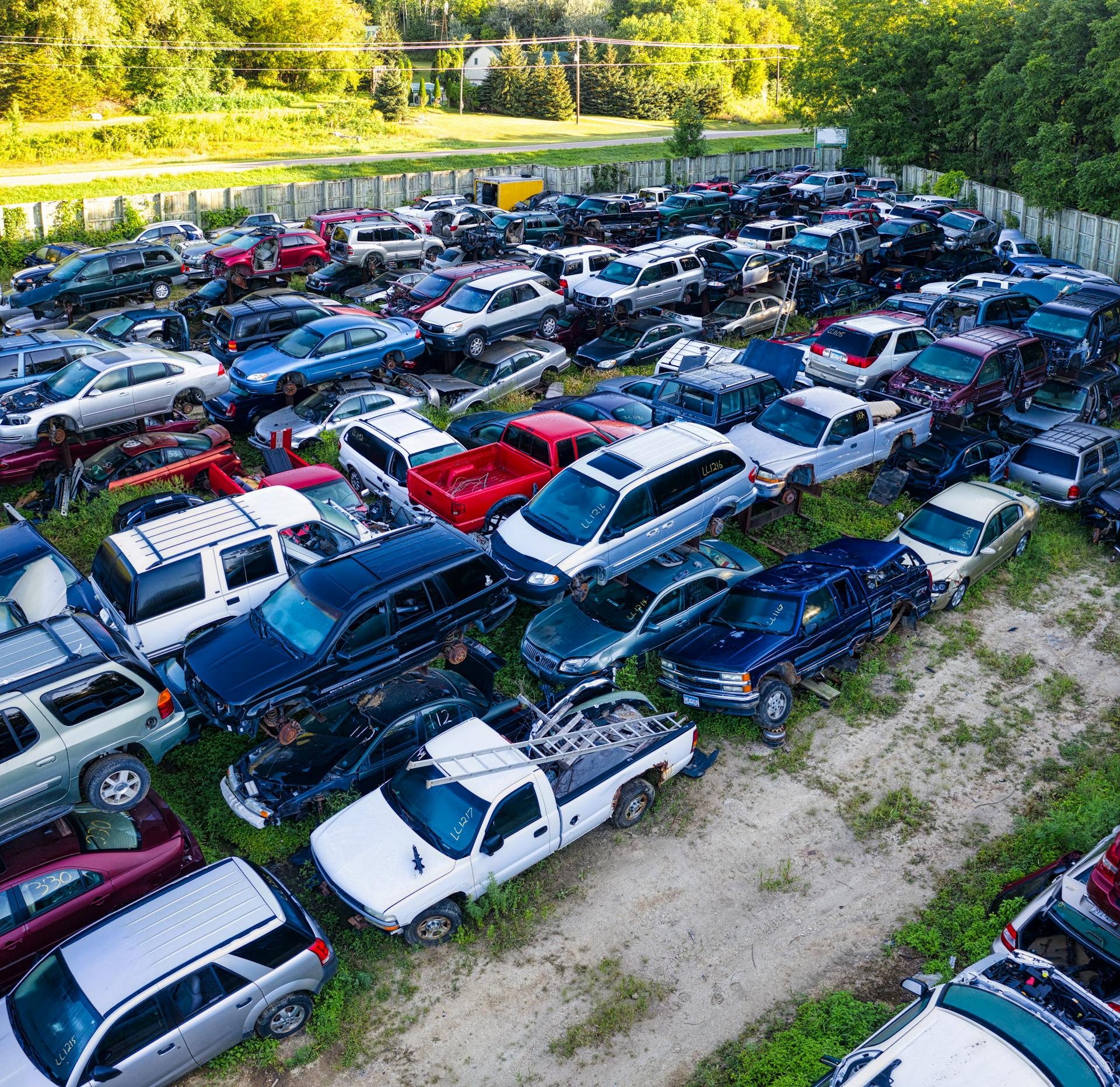 Damaged Junk Cars Parked on a Junk Yard