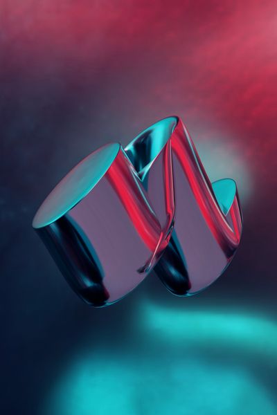 Abstract metallic sculpture lit in red and blue — photo by Steve A Johnson on Pexels
