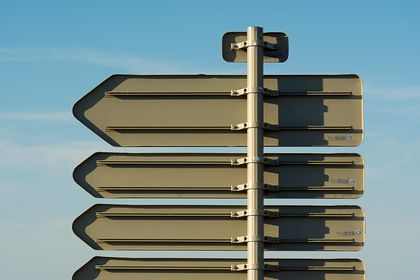 Blank directional signs against the sky — photo by Jan van der Wolf on Pexels