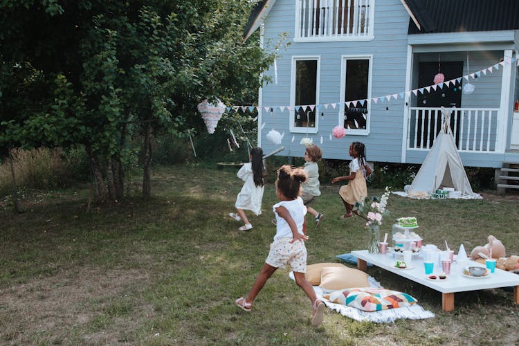 Kids Running From Table To Pinata