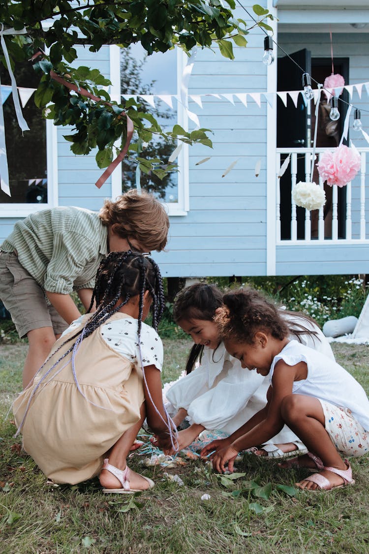 Kids Taking Candies From Broken Pinata