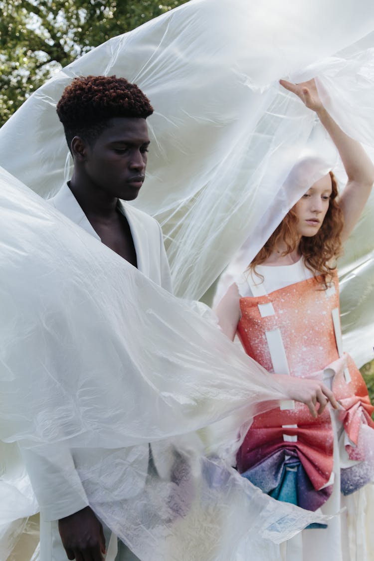 Man And Woman Covered With Plastic