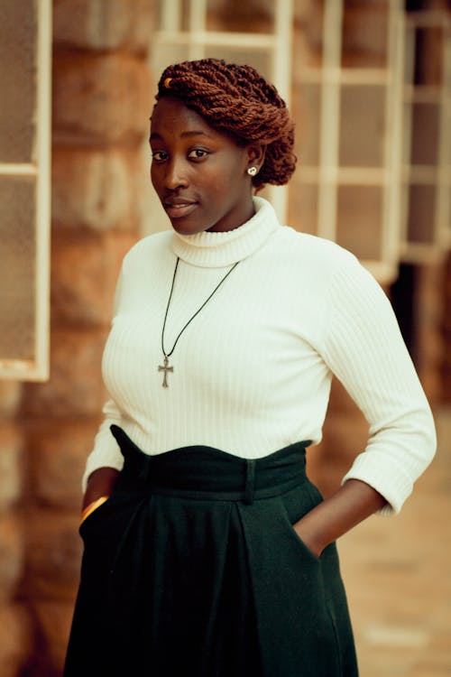 Woman Wearing White Knit Sweater and Black Skirt