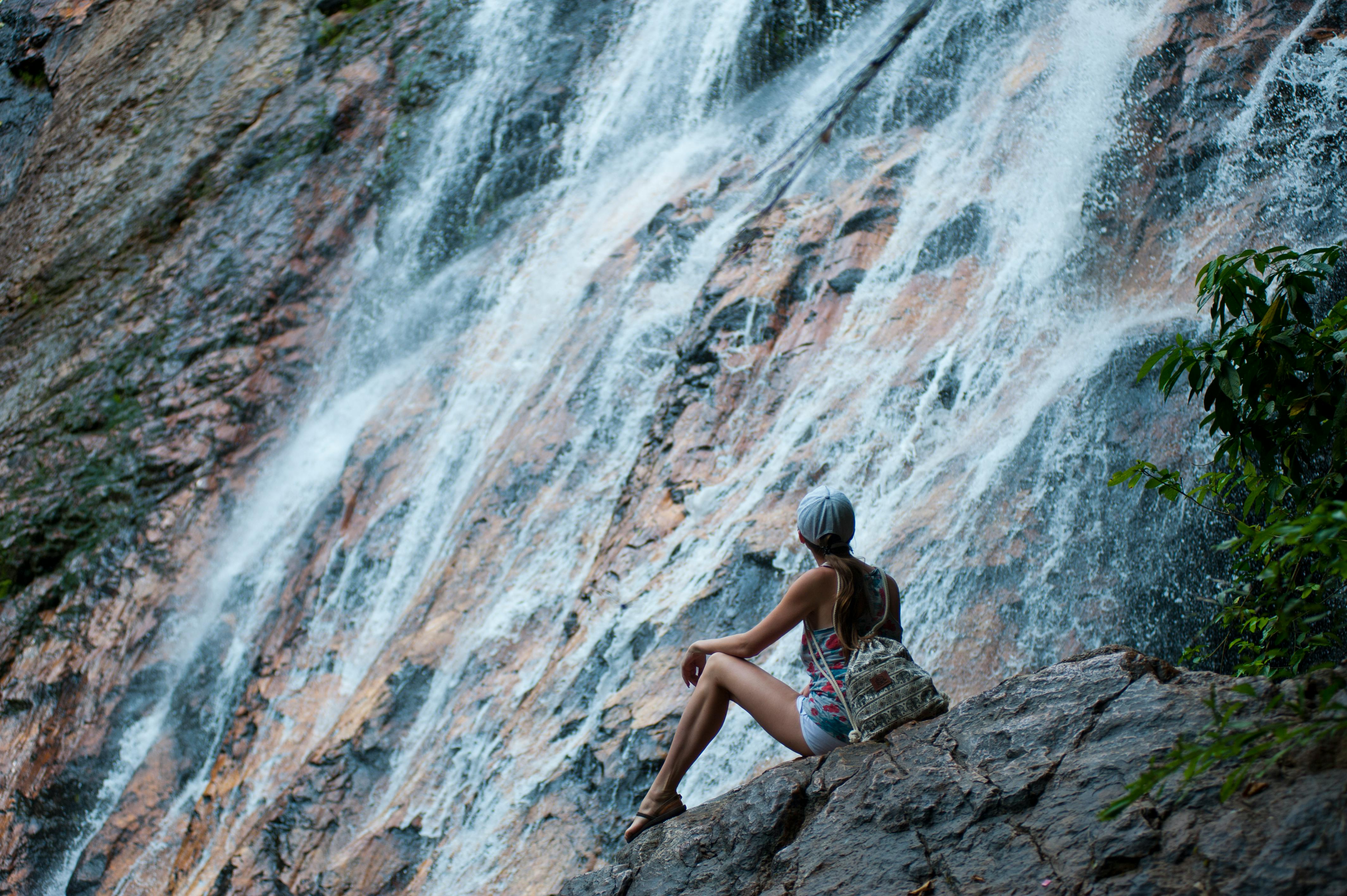 woman near waterfalls