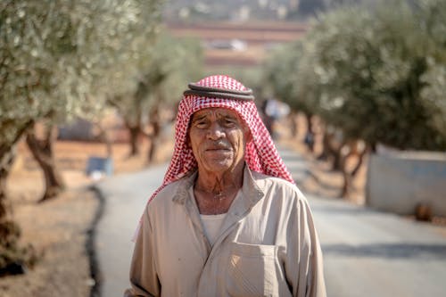 Arab Old Man Standing by Road