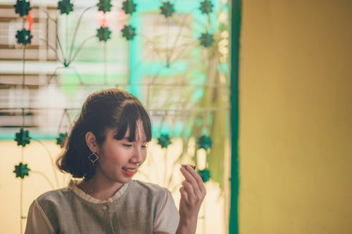 Close-Up Photography of a Woman Smiling