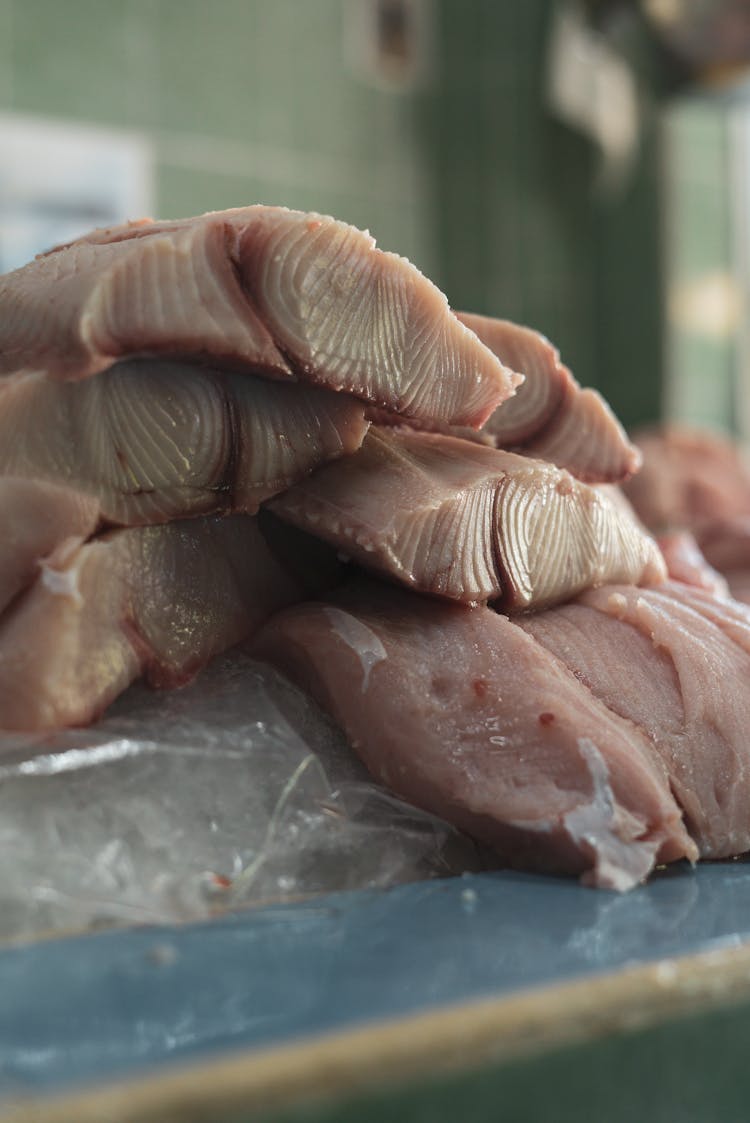 Close Up On Meat Slices On Counter