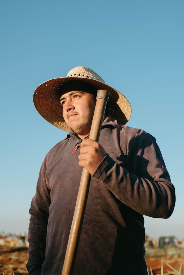 Farmer Taking A Break From Work At Agave Plantation